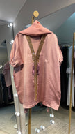 Kids Abaya made of Luxurious Harir Maqsoud Fabric in Baby Pink color.