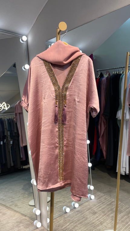 Kids Abaya made of Luxurious Harir Maqsoud Fabric in Baby Pink color.