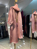 Kids Abaya made of Luxurious Harir Maqsoud Fabric in Baby Pink color.