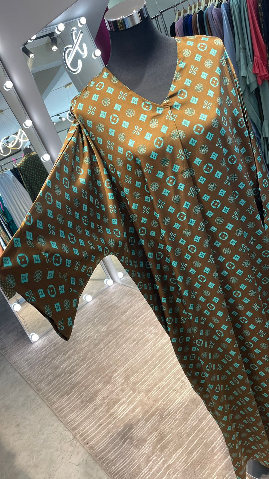 Brown Satin Kaftan with Turquoise pattern Design.