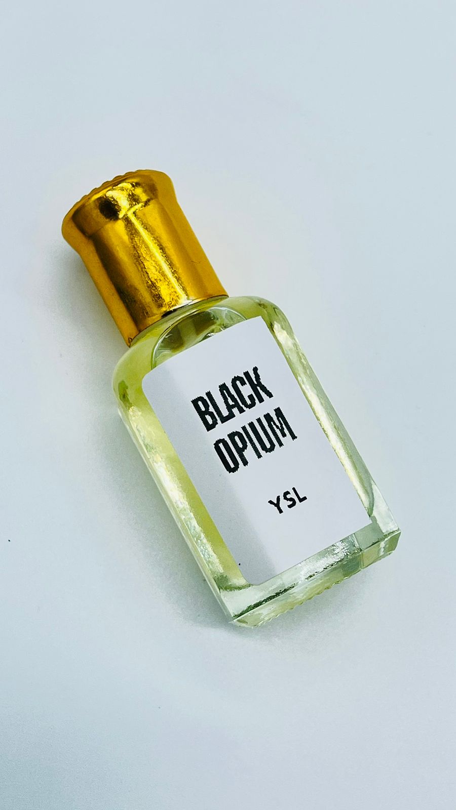 Black Opium Yves Saint Laurent 12ML Oil perfume.