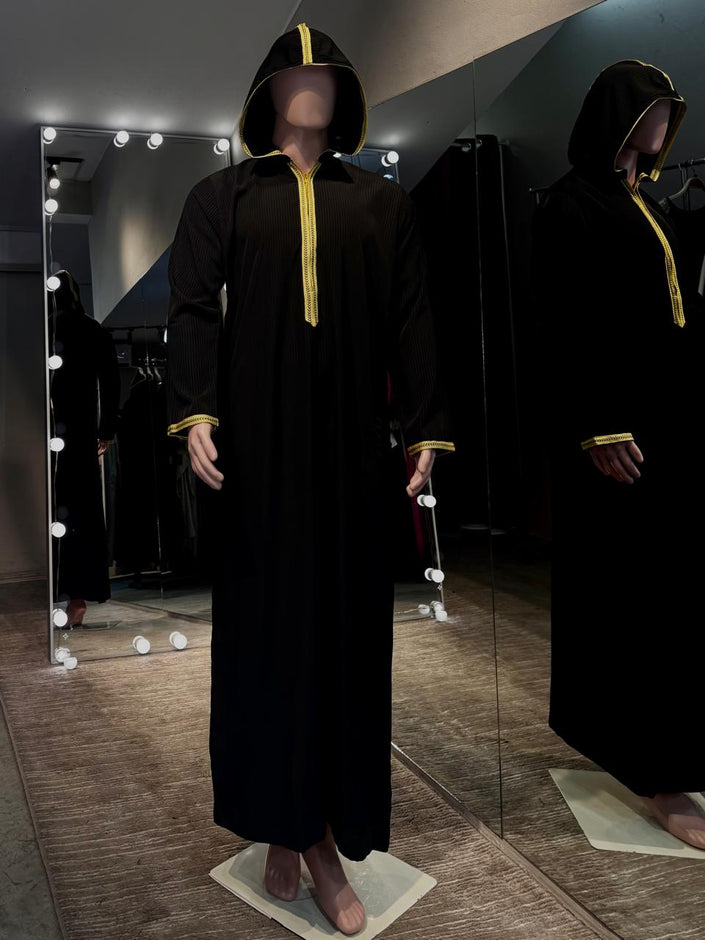Men Black Slim fit kandura with gold thread embroidery and cap.