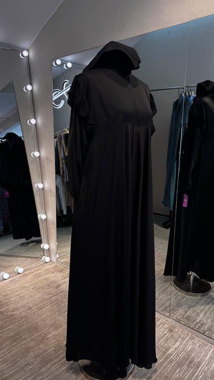 Black umbrella Turtle neck with chiffon Flare shoulder.