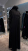 Black umbrella Turtle neck with chiffon Flare shoulder.