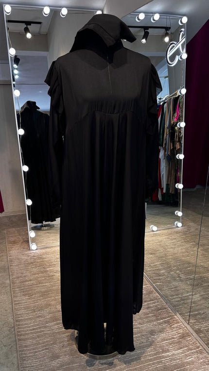 Black umbrella Turtle neck with chiffon Flare shoulder.