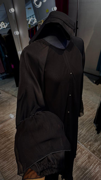 Black umbrella Nida & Chiffon combination with Front button and Balloon ruffle Sleeves.