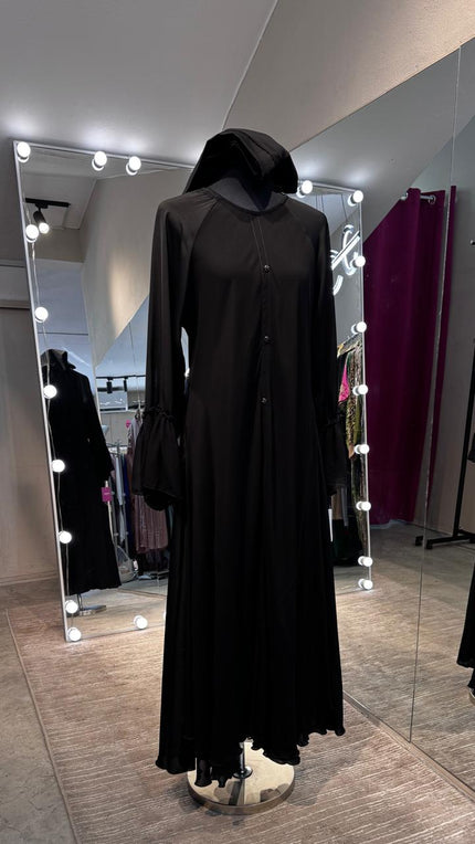 Black umbrella Nida & Chiffon combination with Front button and Balloon ruffle Sleeves.