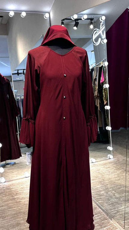 Maroon umbrella Nida & Chiffon combination with Front button and Balloon ruffle Sleeves.