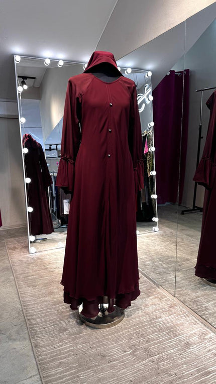 Maroon umbrella Nida & Chiffon combination with Front button and Balloon ruffle Sleeves.