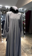Gray umbrella Nida & Chiffon combination with Front button and Balloon ruffle Sleeves.