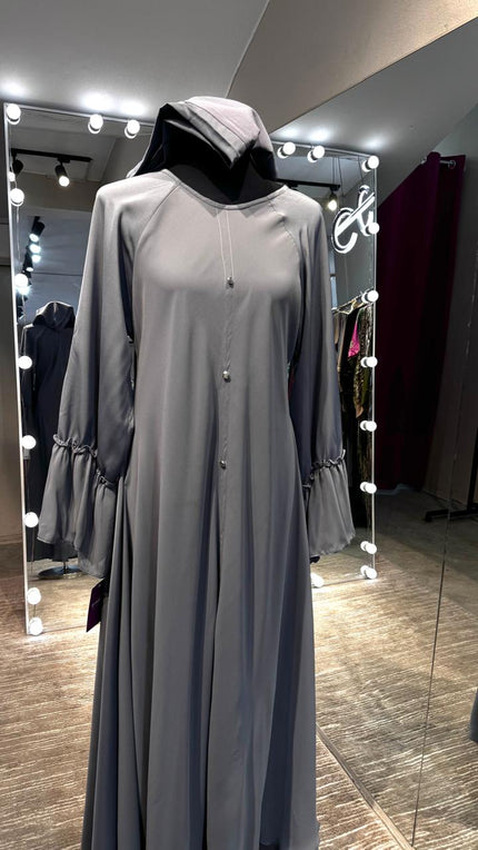 Gray umbrella Nida & Chiffon combination with Front button and Balloon ruffle Sleeves.