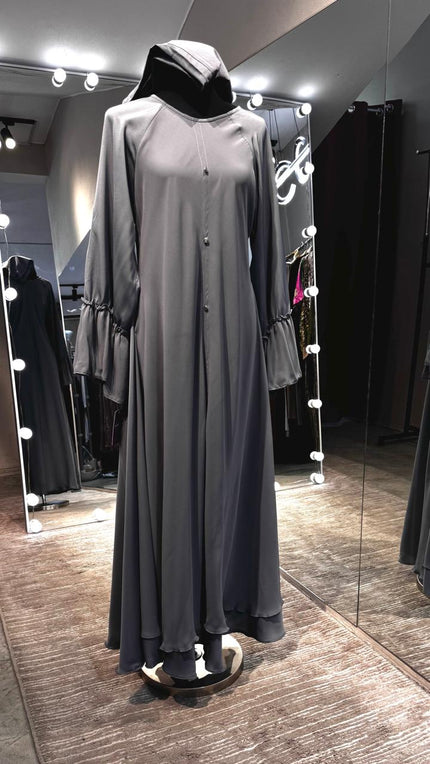 Gray umbrella Nida & Chiffon combination with Front button and Balloon ruffle Sleeves.