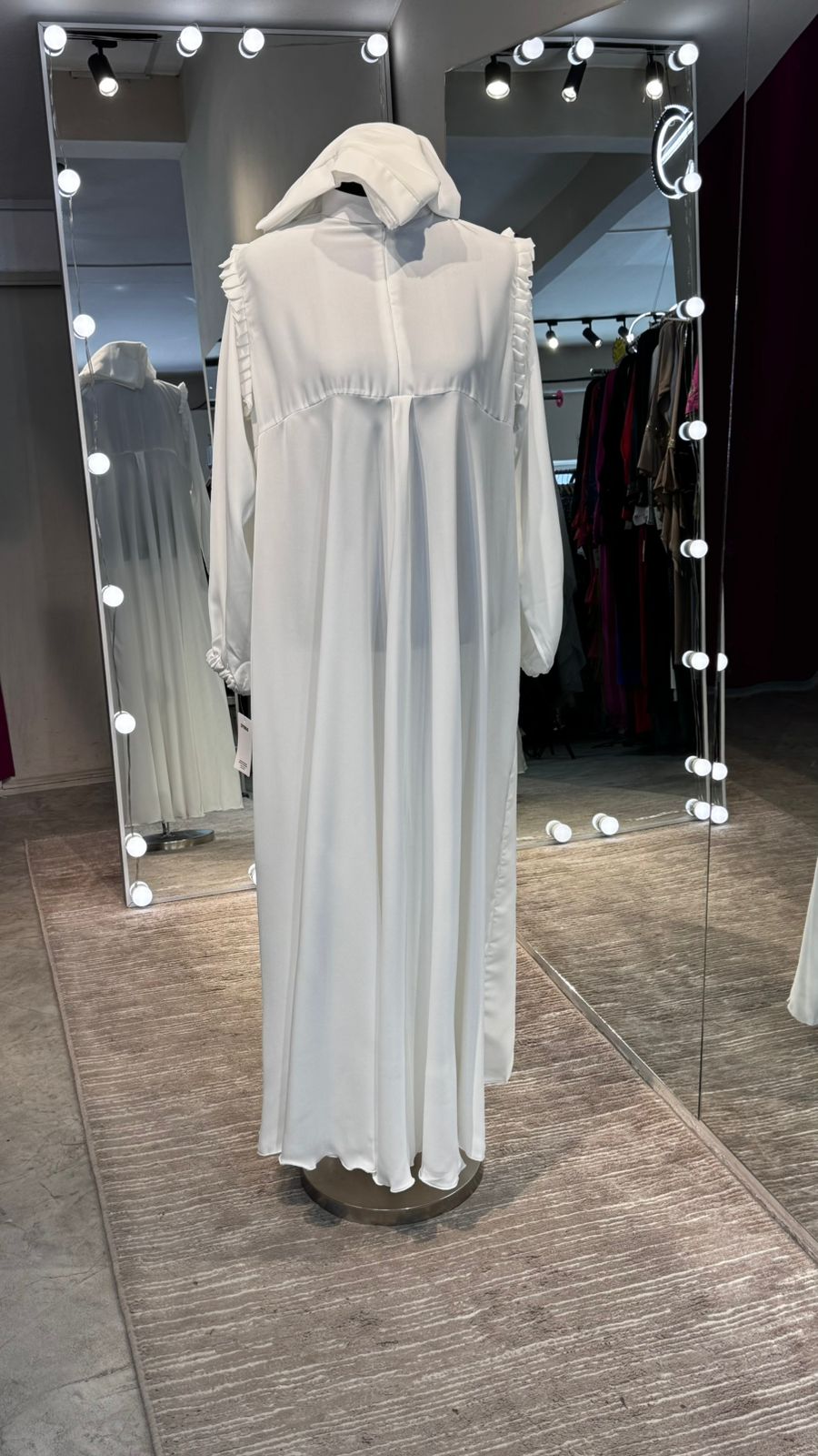 White umbrella Turtle neck with chiffon Flare shoulder.